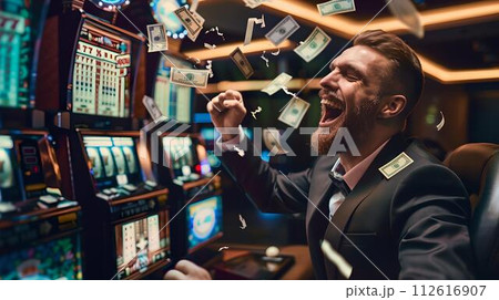 Ecstatic man celebrating win at slot machines in a vibrant casino. high-energy gaming floor atmosphere captured in dynamic photo. lifestyle and leisure in nightlife entertainment. AI 112616907