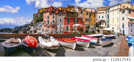 Italy travel, Liguria region. Scenic colorful traditional village Tellaro with old fishing boats. la Spezia province. Italy travel, Liguria region. Scenic colorful traditional village Tellaro with old fishing boats. la Spezia province. 112617543