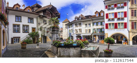 Charming medieval towns and vilages of Switzerland - old town of Murten with floral streets, canton Fribourg 112617544