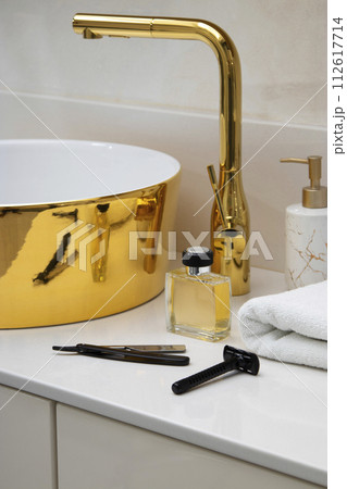 bathroom interior with white towel and water faucet bathroom interior with white towel and water faucet 112617714