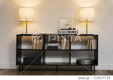 table and lamp in the room 112617719