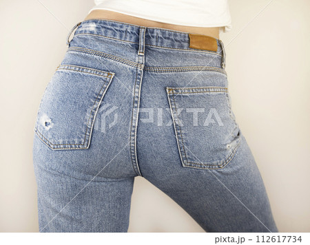 Close up of buttocks in blue jeans. Concept of a sexy woman in jeans. 112617734