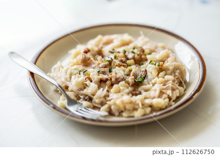 Traditional Slovak dish Halusky - Strapacky with sauerkraut on a plate Traditional Slovak dish Halusky - Strapacky with sauerkraut on a plate 112626750