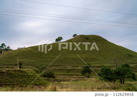 Caucasian mountain. Dagestan. Trees, rocks, mountains, view of the green mountains. Beautiful summer landscape. Caucasian mountain. Dagestan. Trees, rocks, mountains, view of the green mountains. Beautiful summer landscape. 112629938