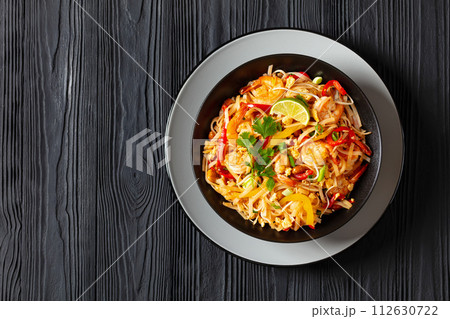 pad thai with shrimps, peanuts, eggs, bean sprouts pad thai with shrimps, peanuts, eggs, bean sprouts 112630722