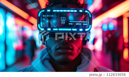 A young man wearing a futuristic headset, surrounded by vibrant red and blue lights. The atmosphere exudes advanced technology, innovation, sci-fi, interactive digital environment, striking scene A young man wearing a futuristic headset, surrounded by vibrant red and blue lights. The atmosphere exudes advanced technology, innovation, sci-fi, interactive digital environment, striking scene 112633056