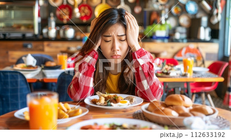 Dieting healthy young woman, having temptation hungry of food 112633192