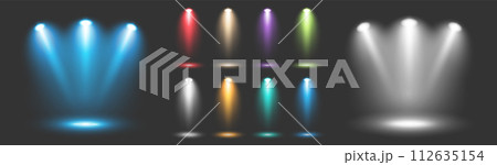 A large set of colored spotlights to illuminate the stage with rays on a dark background. 112635154