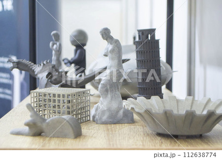 Many different art models from polyamide powder printed on 3D printer. Technology Multi Jet Fusion MJF. Three-dimensional model printed 3D printer from plastic. Additive progressive powder technology Many different art models from polyamide powder printed on 3D printer. Technology Multi Jet Fusion MJF. Three-dimensional model printed 3D printer from plastic. Additive progressive powder technology 112638774