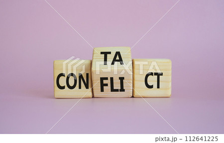 Contact and Conflict symbol. Wooden cubes with words Contact and Conflict. Beautiful pink background. Contact and Conflict and business concept. Copy space Contact and Conflict symbol. Wooden cubes with words Contact and Conflict. Beautiful pink background. Contact and Conflict and business concept. Copy space 112641225