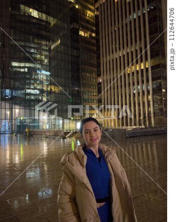 Beautiful young woman tourist in Paris at night. Paris is the capital and most populous city of France. Beautiful young woman tourist in Paris at night. Paris is the capital and most populous city of France. 112644706