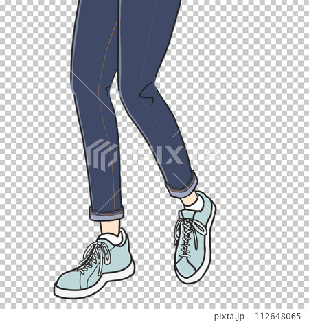 A stylish and sporty woman wearing denim pants and sneakers walking with light steps. 112648065
