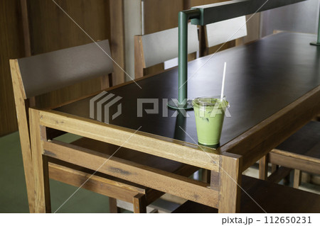 Matcha latte or iced green tea Matcha latte or iced green tea 112650231