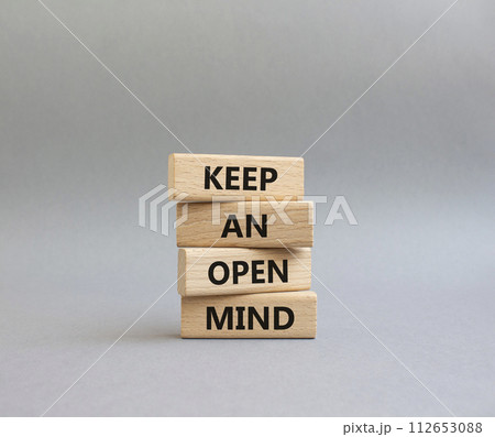 Keep an open mind symbol. Wooden blocks with words Keep an open mind. Beautiful grey background. Business and Keep an open mind concept. Copy space. Keep an open mind symbol. Wooden blocks with words Keep an open mind. Beautiful grey background. Business and Keep an open mind concept. Copy space. 112653088
