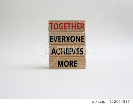 Together Everyone Achieves More symbol. Concept words Together Everyone Achieves More on wooden blocks. Beautiful white background. Business concept. Copy space. Together Everyone Achieves More symbol. Concept words Together Everyone Achieves More on wooden blocks. Beautiful white background. Business concept. Copy space. 112654857