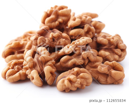 shelled walnuts heap white background 112655834
