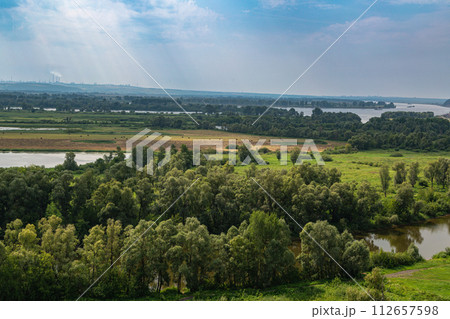 View of the Spassky Cathedral and the city of Yelabuga from the bell tower of the Spassky Cathedral on a sunny spring day. Yelabuga, Tatarstan, Russia View of the Spassky Cathedral and the city of Yelabuga from the bell tower of the Spassky Cathedral on a sunny spring day. Yelabuga, Tatarstan, Russia 112657598