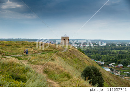 The tower of an ancient Bulgarian fortress on a high cliff on the banks of the Kama River, Elabuga, Tatarstan, Russian Federation 112657741