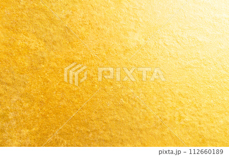 Gold Background Foil Golden Metal Paper Glitter Pattern Effect Glossy Leather Shiny on Wall Floor Backdrop Abstract Pattern Blur Gradient Golden Yellow Orange Effect Material Luxury Premium Pattern. 112660189