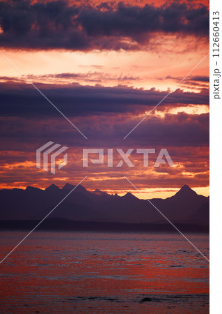 Majestic sunset and reflection on the ocean at dawn 112660413