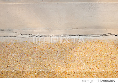 Home building problem. Cracked concrete floor, broken building structure Home building problem. Cracked concrete floor, broken building structure 112660865