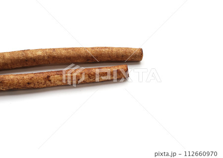 Burdock Root (Gobo) on white background. 112660970