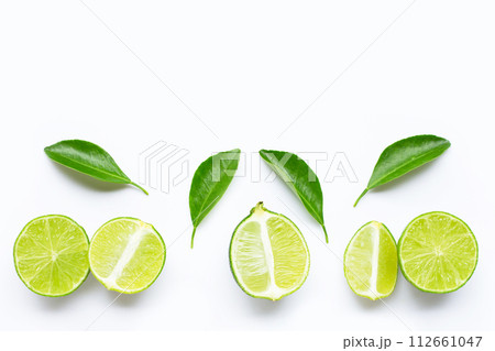 Fresh limes with leaves isolated on white 112661047