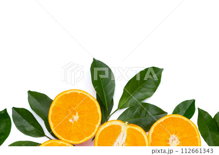 Orange fruit with green leaves on white background. Orange fruit with green leaves on white background. 112661343