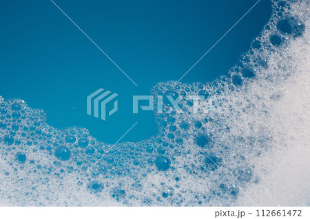 Detergent foam bubble on water. Blue background, Soap sud 112661472