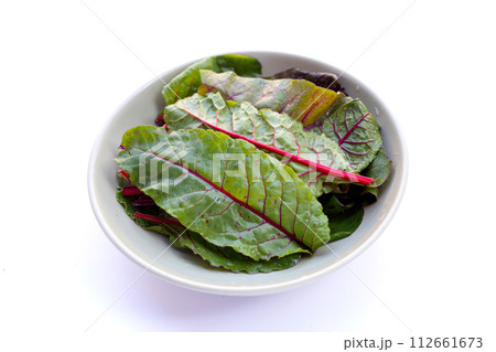 Swiss chard on white background. Baby leaf swiss chard Swiss chard on white background. Baby leaf swiss chard 112661673