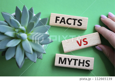 Facts vs Myths symbol. Wooden blocks with words Facts vs Myths. Beautiful green background with succulent plant. Businessman hand. Business and Facts vs Myths concept. Copy space. Facts vs Myths symbol. Wooden blocks with words Facts vs Myths. Beautiful green background with succulent plant. Businessman hand. Business and Facts vs Myths concept. Copy space. 112665139