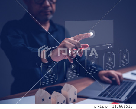 Businessman making video content of business 4.0 in 2023. Man using hand and keyboard for streaming online on virtual screen, watching video on internet, live concert, show or tutorial, content online Businessman making video content of business 4.0 in 2023. Man using hand and keyboard for streaming online on virtual screen, watching video on internet, live concert, show or tutorial, content online 112668516