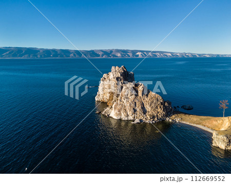 Shamanka Rock. Lake Baikal at Olkhon Island. the village of Khuzhir Shamanka Rock. Lake Baikal at Olkhon Island. the village of Khuzhir 112669552