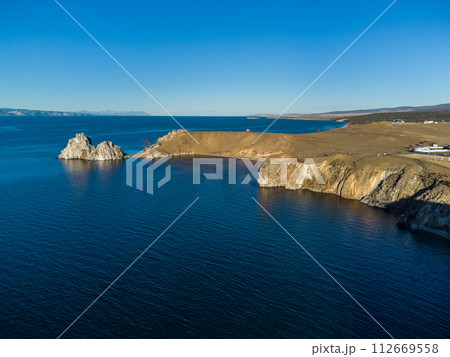 Shamanka Rock. Lake Baikal at Olkhon Island. the village of Khuzhir 112669558