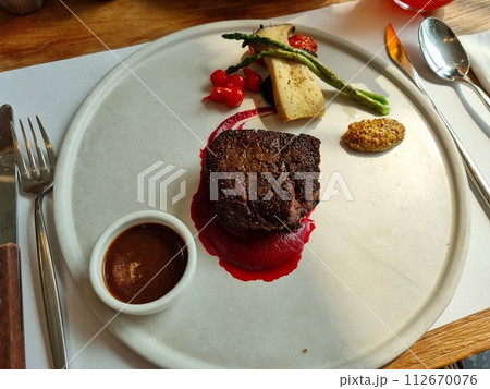 a gourmet beef steak plate a gourmet beef steak plate 112670076