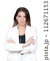A young woman in a white blazer on a transparent background. 112671153