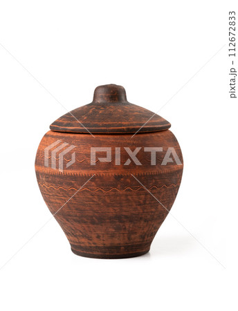 Brown ceramic pot isolated on a white background 112672833