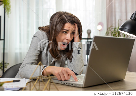 Business woman programmer software developer loses, system error virus bad news data loss at office 112674130