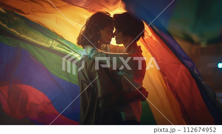LGBT Lesbian couple love moments happiness concept. sunset LGBT Lesbian couple love moments happiness concept. sunset 112674952
