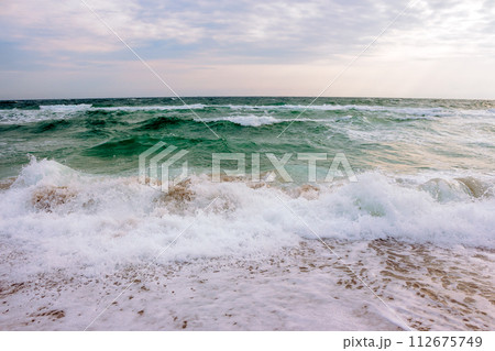 seascape in morning light. vacation season background. stormy summer weather seascape in morning light. vacation season background. stormy summer weather 112675749