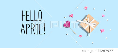 Hello April message with a small gift box and hearts 112679771