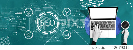 SEO concept with person using a laptop 112679830