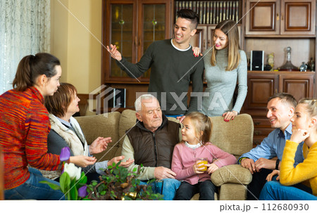 Big friendly family chatting at home Big friendly family chatting at home 112680930