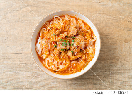 Korean udon ramen noodles with pork in kimchi soup Korean udon ramen noodles with pork in kimchi soup 112686586