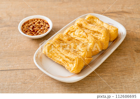 fried tofu with sauce 112686695
