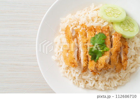 Steamed Rice with Fried Chicken or Hainanese Chicken Rice 112686710