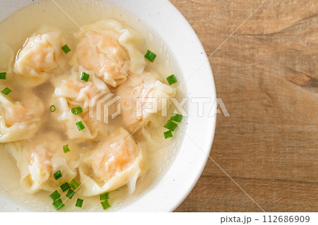 shrimp dumpling soup in white bowl shrimp dumpling soup in white bowl 112686909