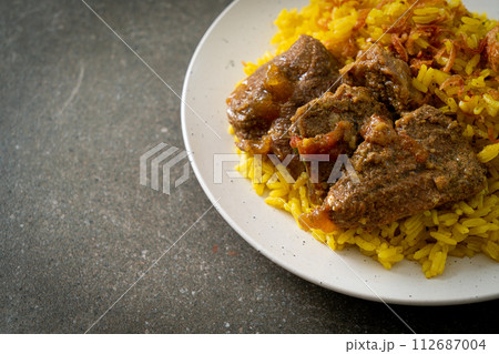 Beef Biryani or Curried rice and beef - Thai-Muslim version of Indian biryani, with fragrant yellow rice and beef 112687004