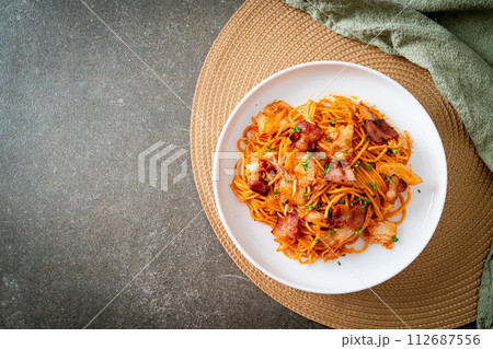 stir-fried spaghetti with kimchi and bacon stir-fried spaghetti with kimchi and bacon 112687556