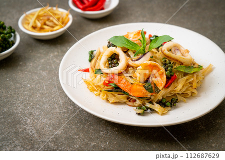 stir fried spicy noodles with sea food stir fried spicy noodles with sea food 112687629